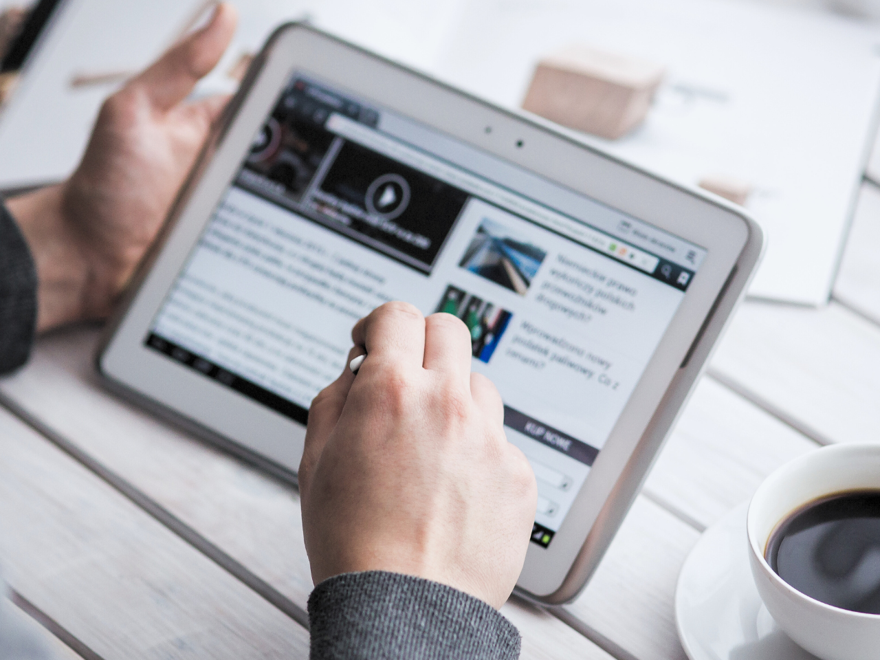 User reading a sponsored advertorial on a tablet