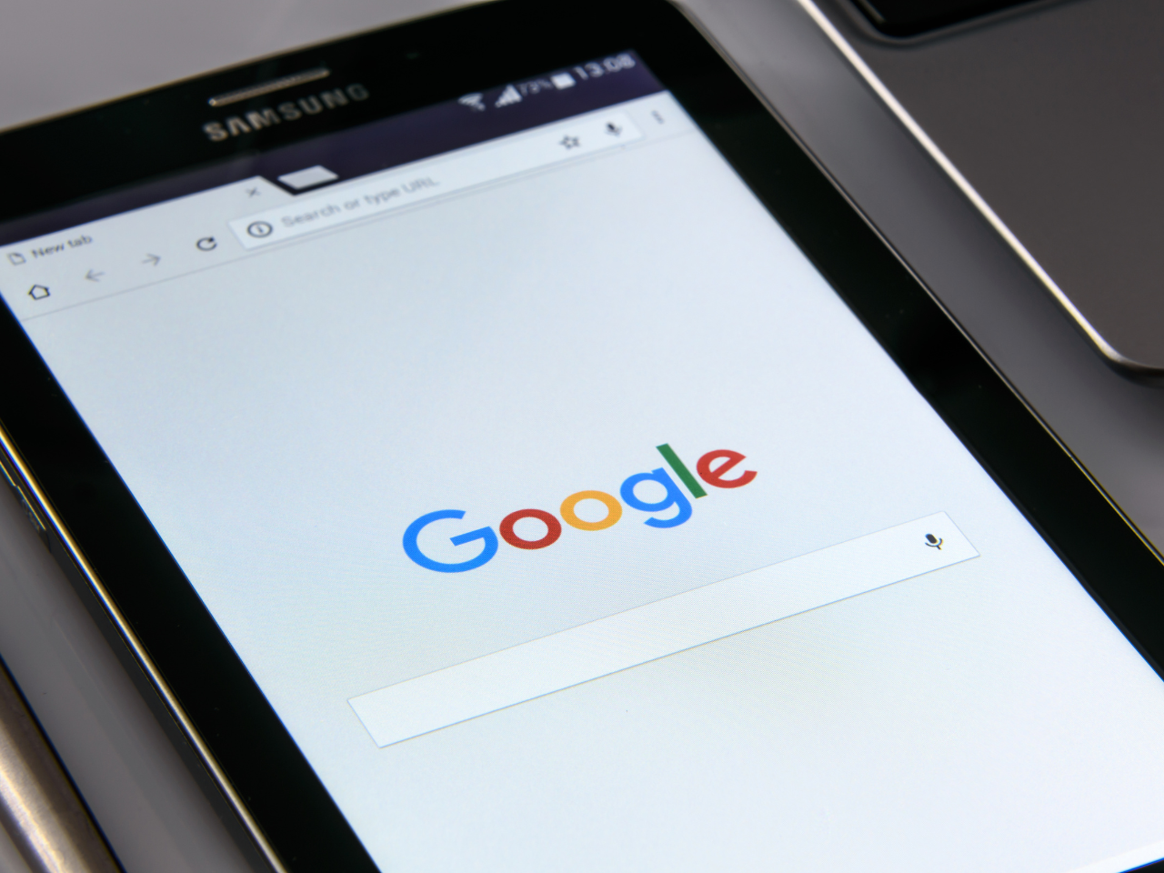 Black Samsung Tablet Display Google Browser on Screen