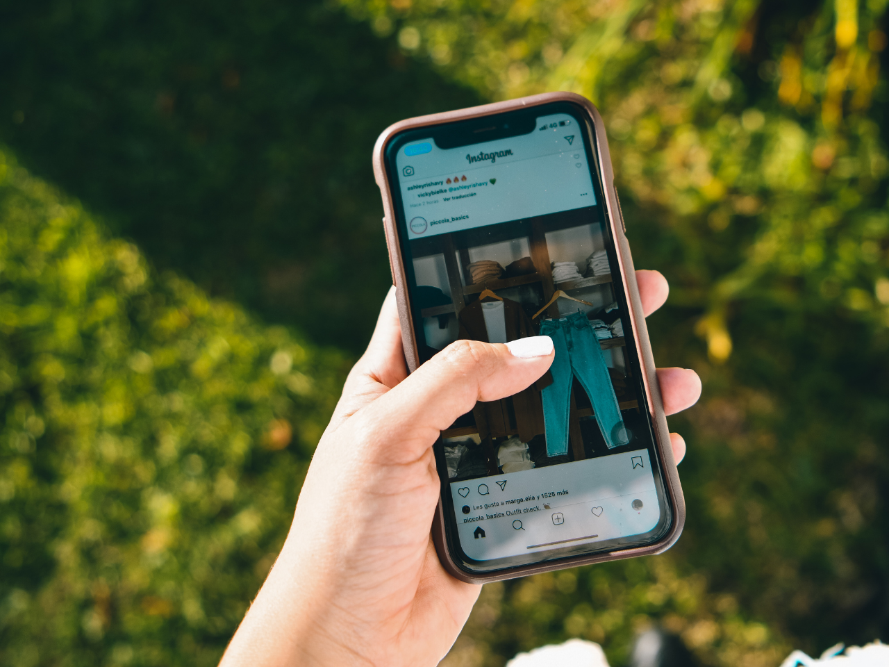 Photo of Person Using Instagram on Mobile Phone