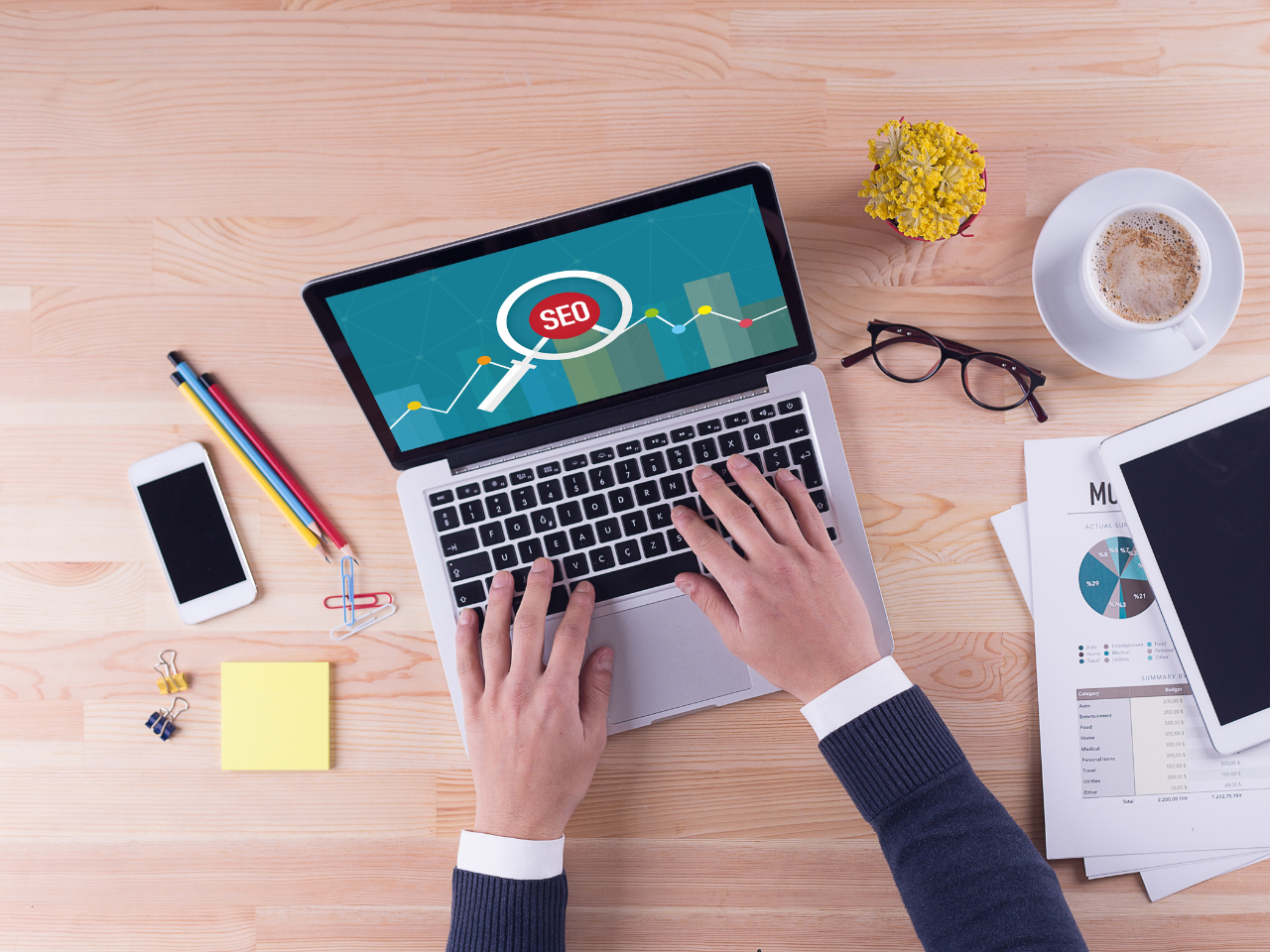 Businessman is working on desk - SEO
