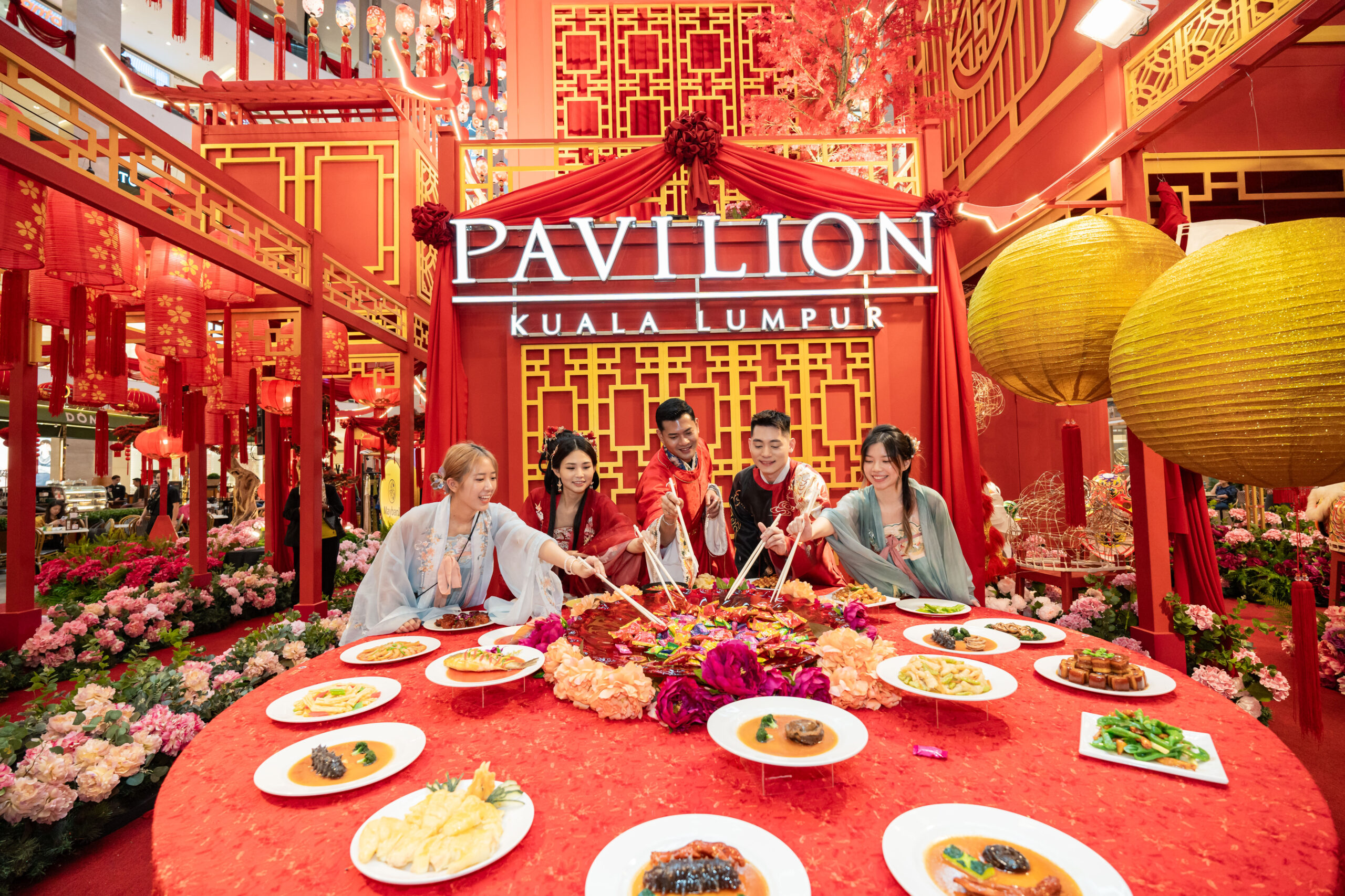 Festive Chinese New Year display at Pavilion Kuala Lumpur for the Year of the Snake 2025, featuring red lanterns, golden decorations, and symbolic snake motifs at the mall’s Centre Court.