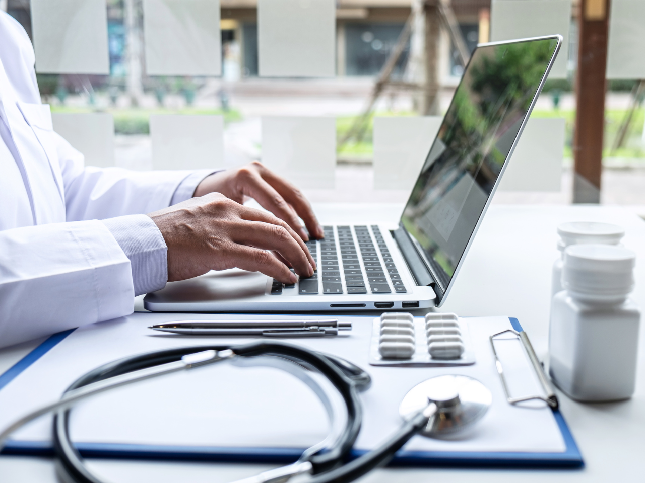 Doctor Working with Laptop